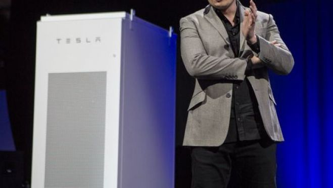 Tesla expands into batteries for homes